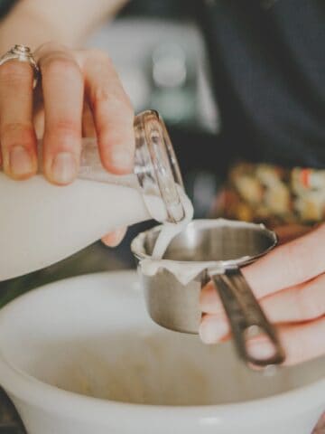 Women making homemade ranch dressing