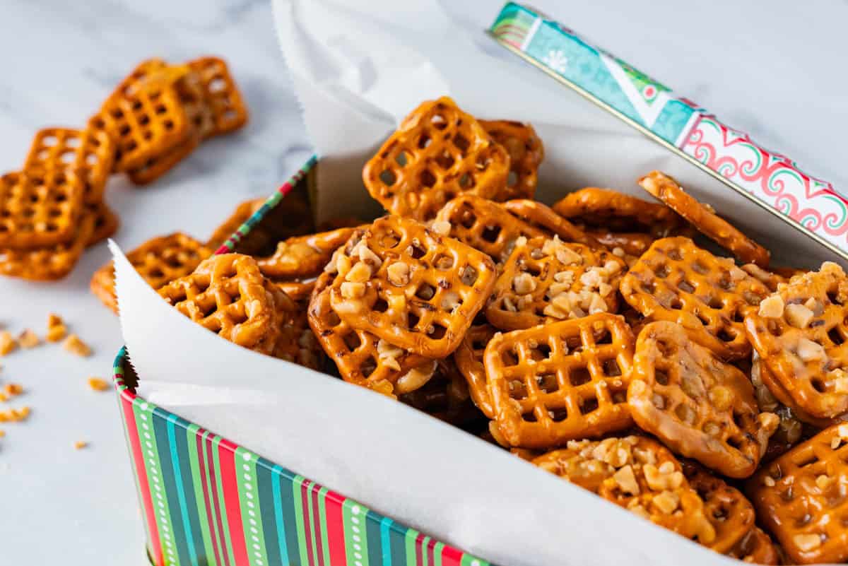 The pretzels in a Christmas tin for gift giving. 