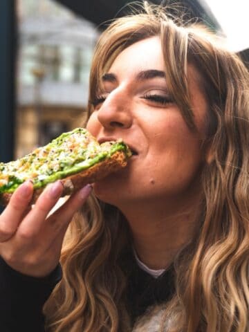 eating avocado toast
