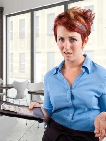waitress frustrated with bill