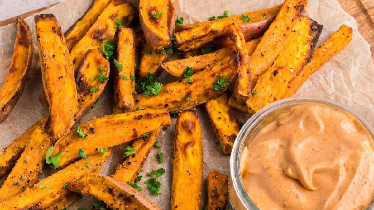 Air Fryer Sweet Potato Wedges served with a dip. 