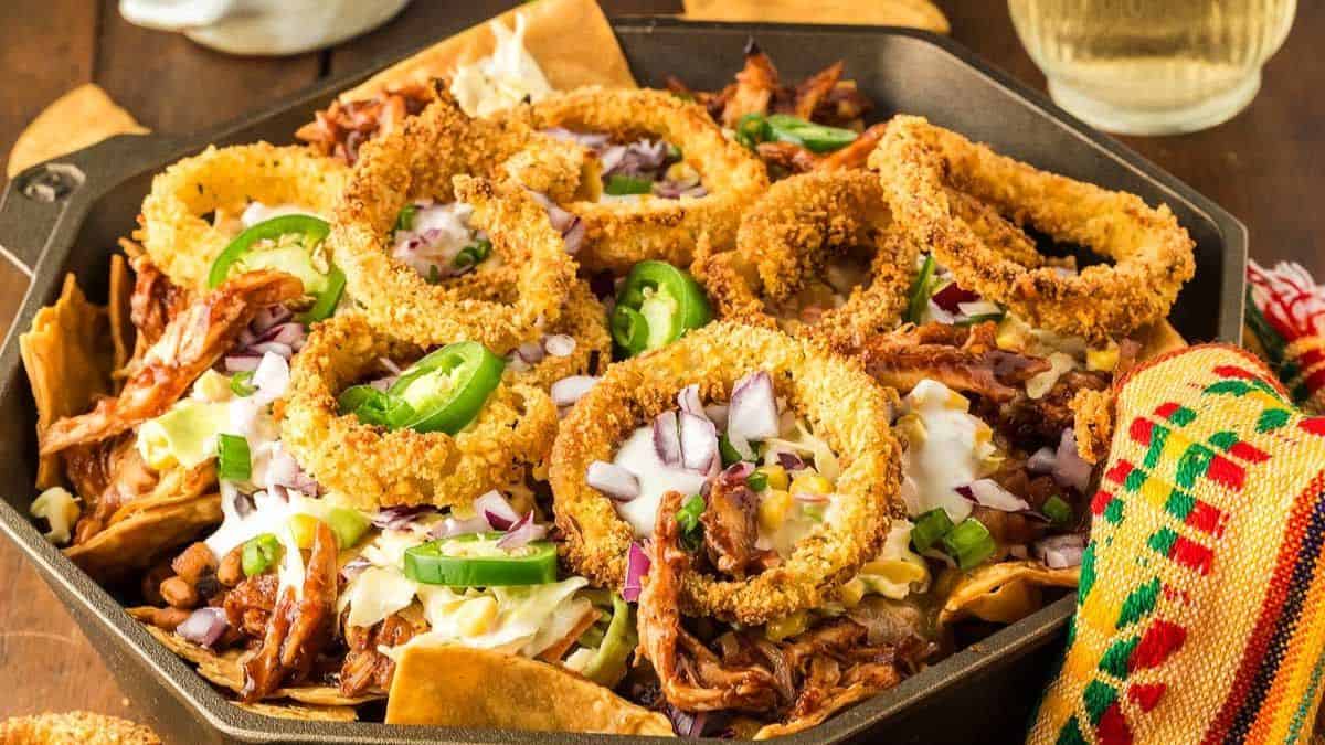 BBQ Chicken Nachos served in a pan.