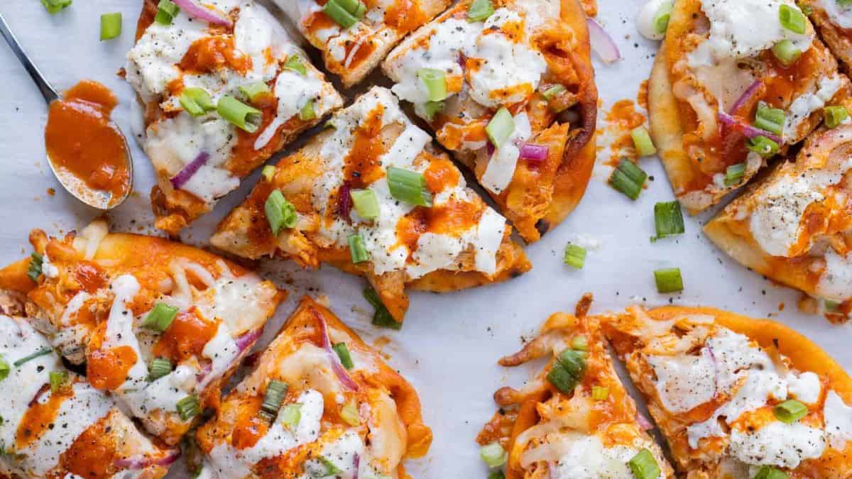 A few slices of Buffalo Chicken Naan Pizza.