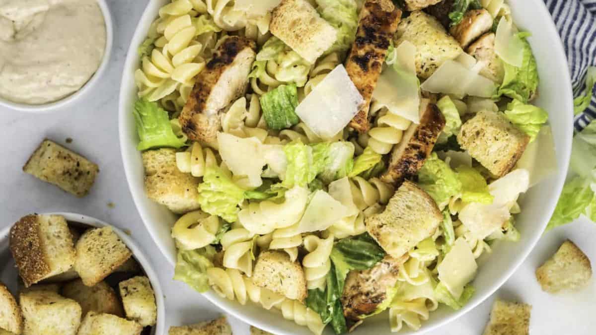 Chicken Caesar Pasta Salad served in a bowl. 