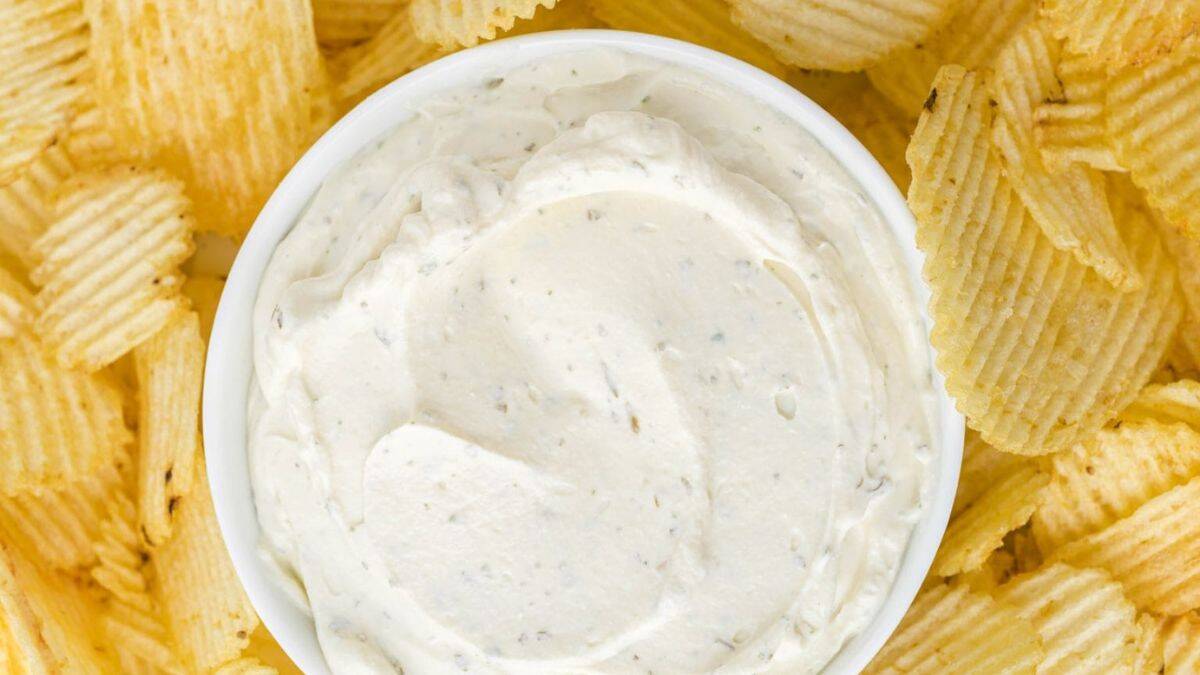 Chip Dip served in a bowl with potato chips on the side.
