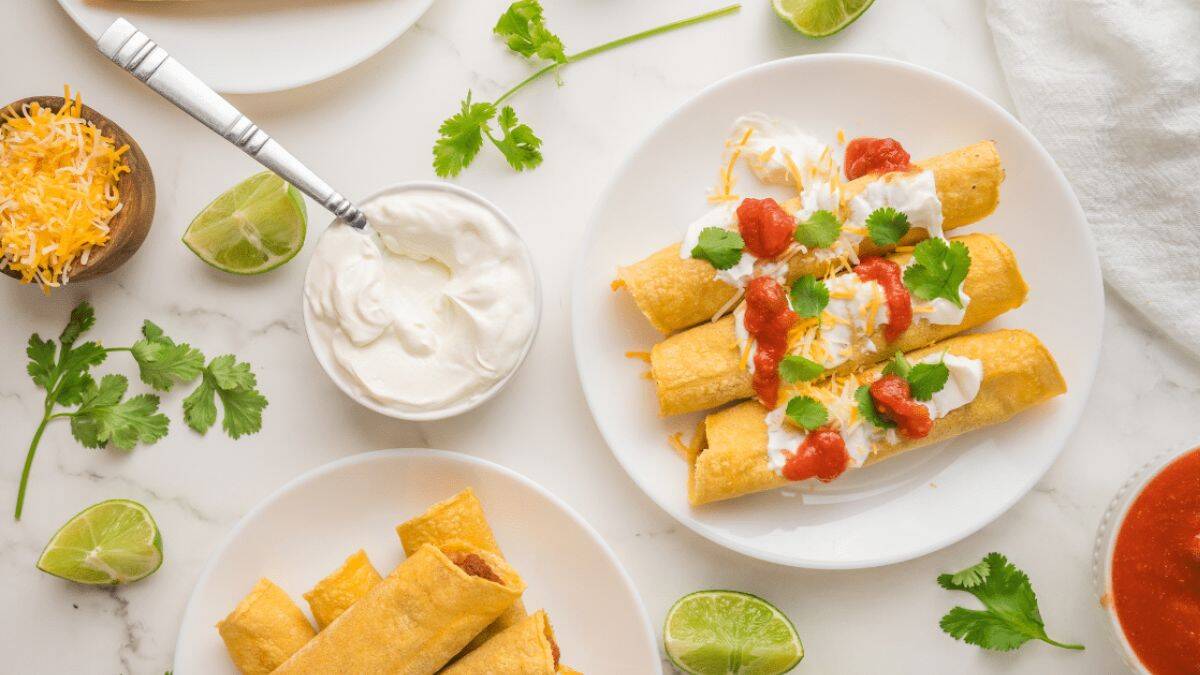 A few pieces of Bean and Cheese Taquitos served on a plate.