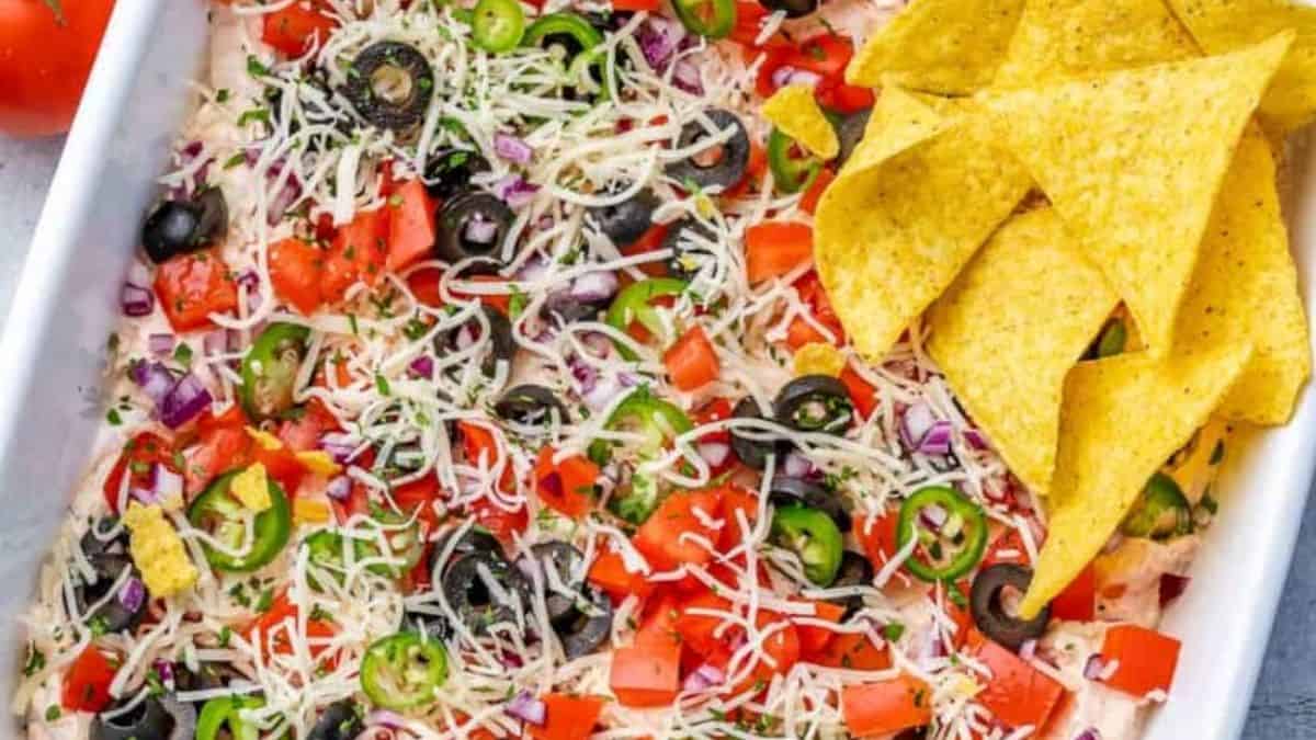 Taco Dip served in a baking dish.