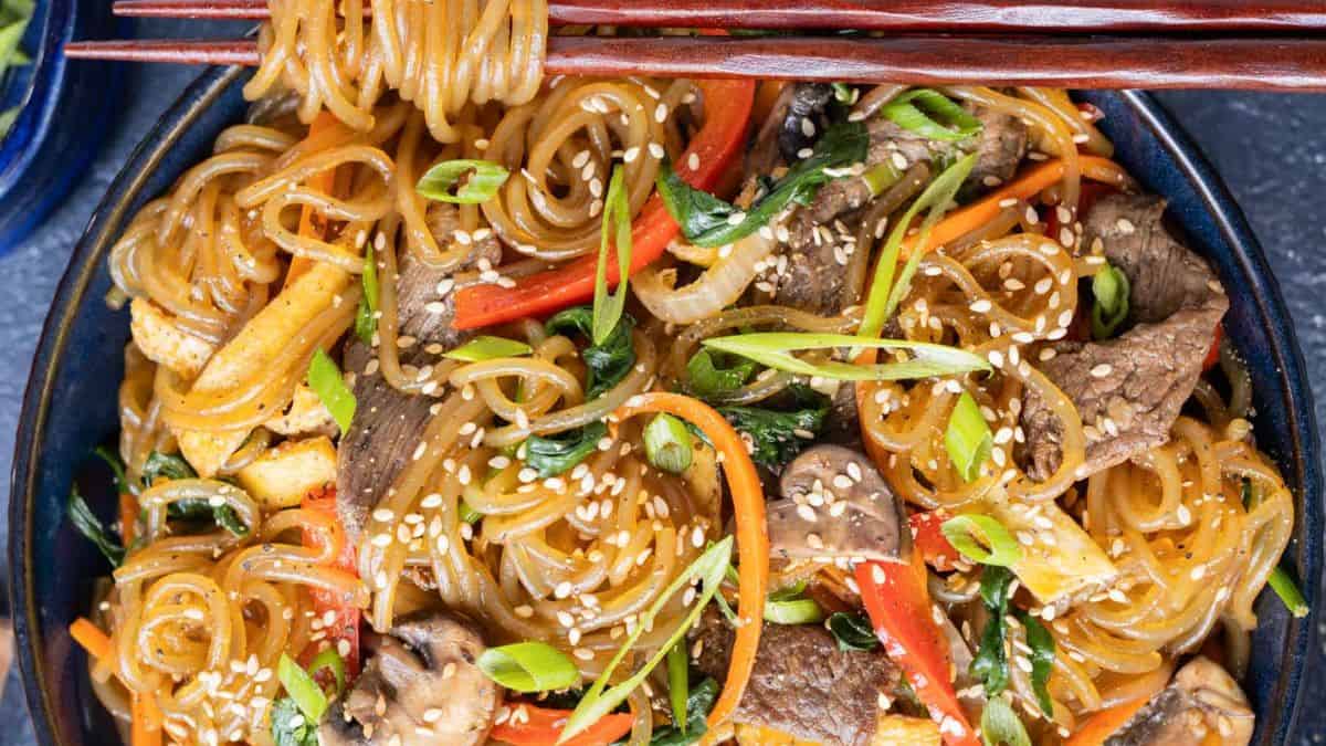 Japchae – Korean Glass Noodles served in a bowl.