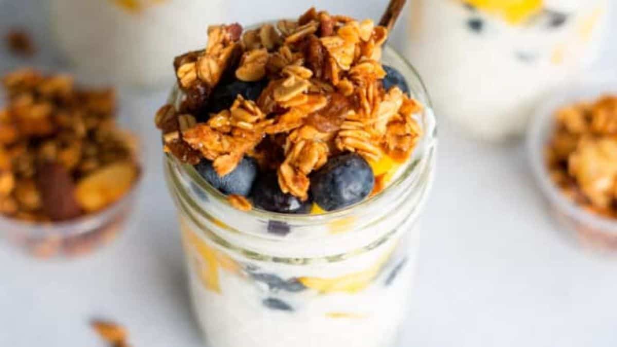 A single serving of Greek Yogurt Parfaits with Granola and Fruit.