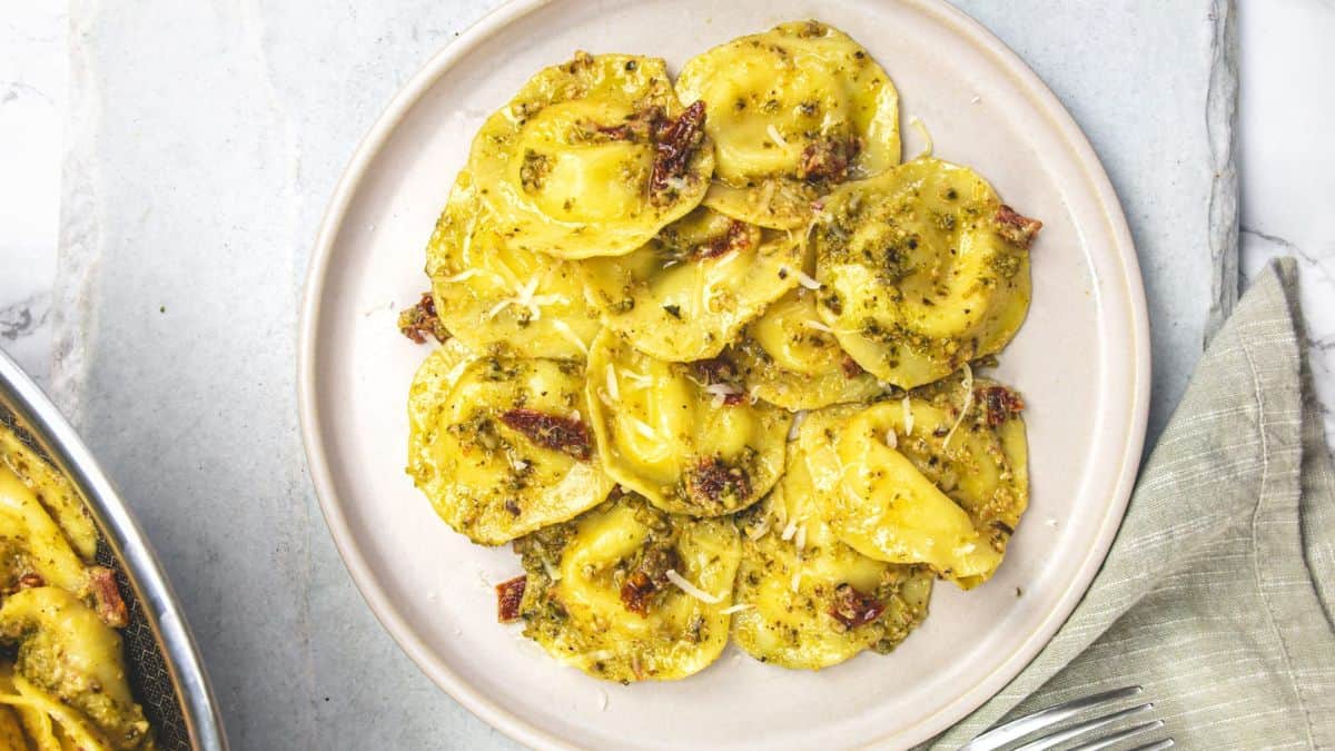Pesto Ravioli served in a plate.