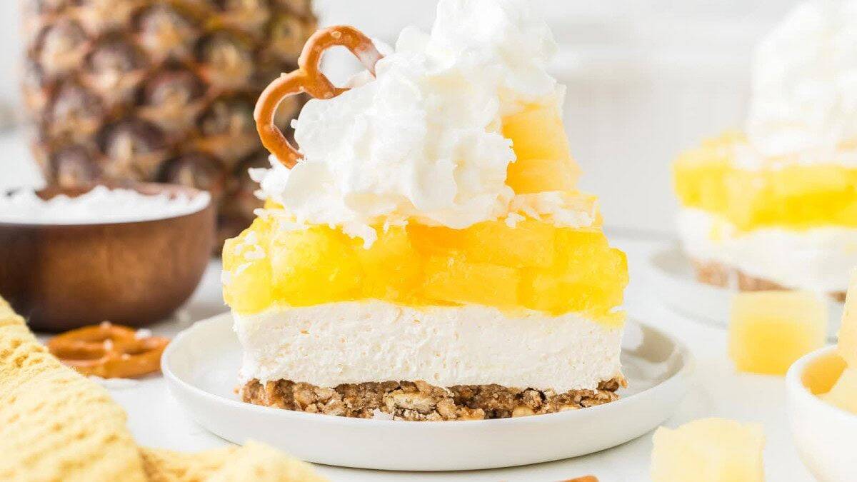 A serving of Pineapple Pretzel Salad served on a plate.