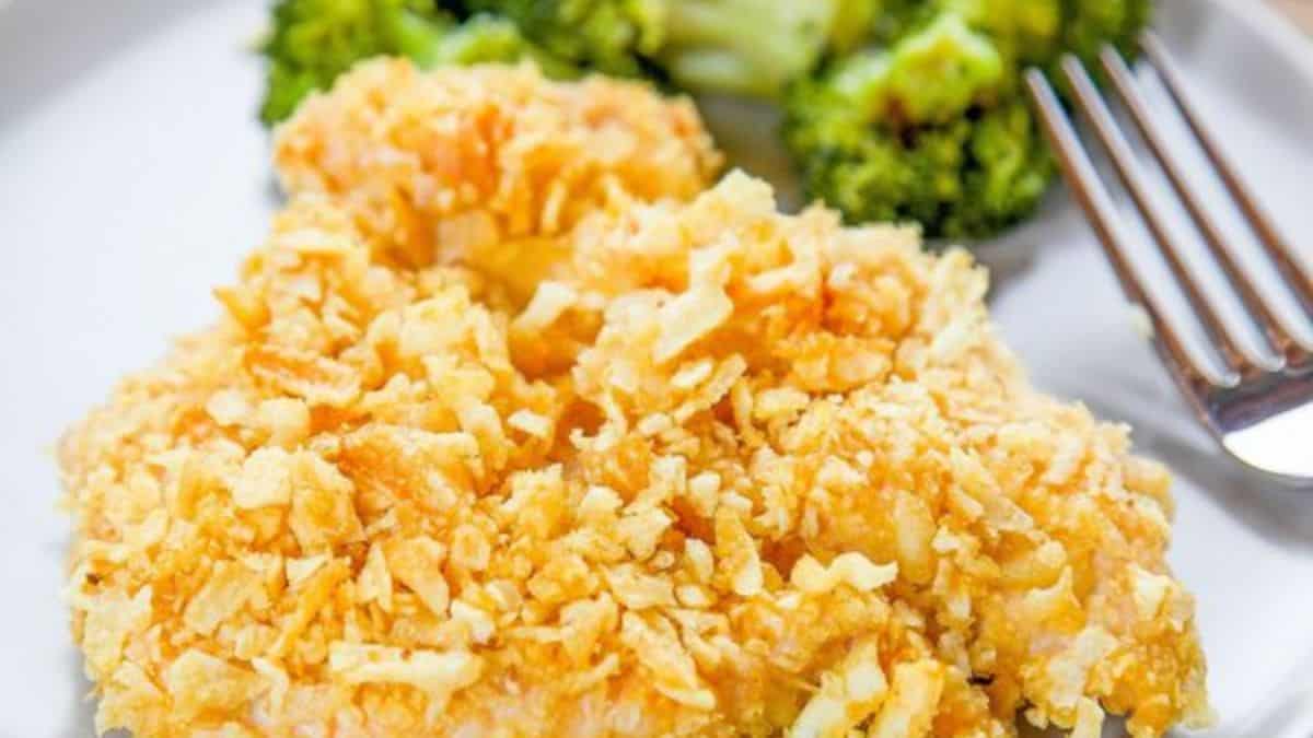 Potato Chip Chicken with side  broccoli served on a plate. 