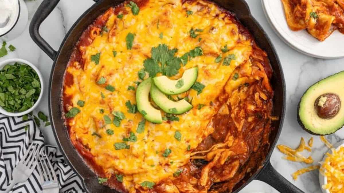 Skillet Enchiladas in a cast iron skillet.