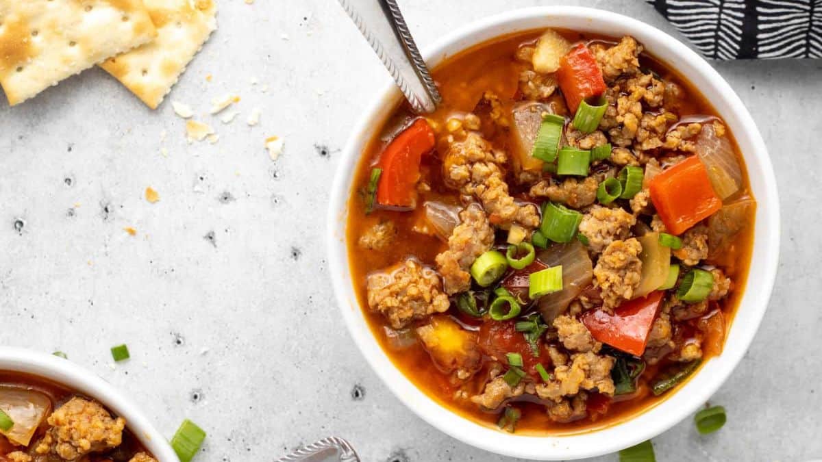 Spicy Sausage Soup served in a bowl. 