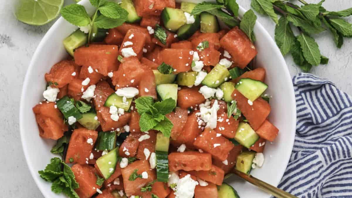 Summer Watermelon Salad With Mint And Cucumber served in a bowl. 
