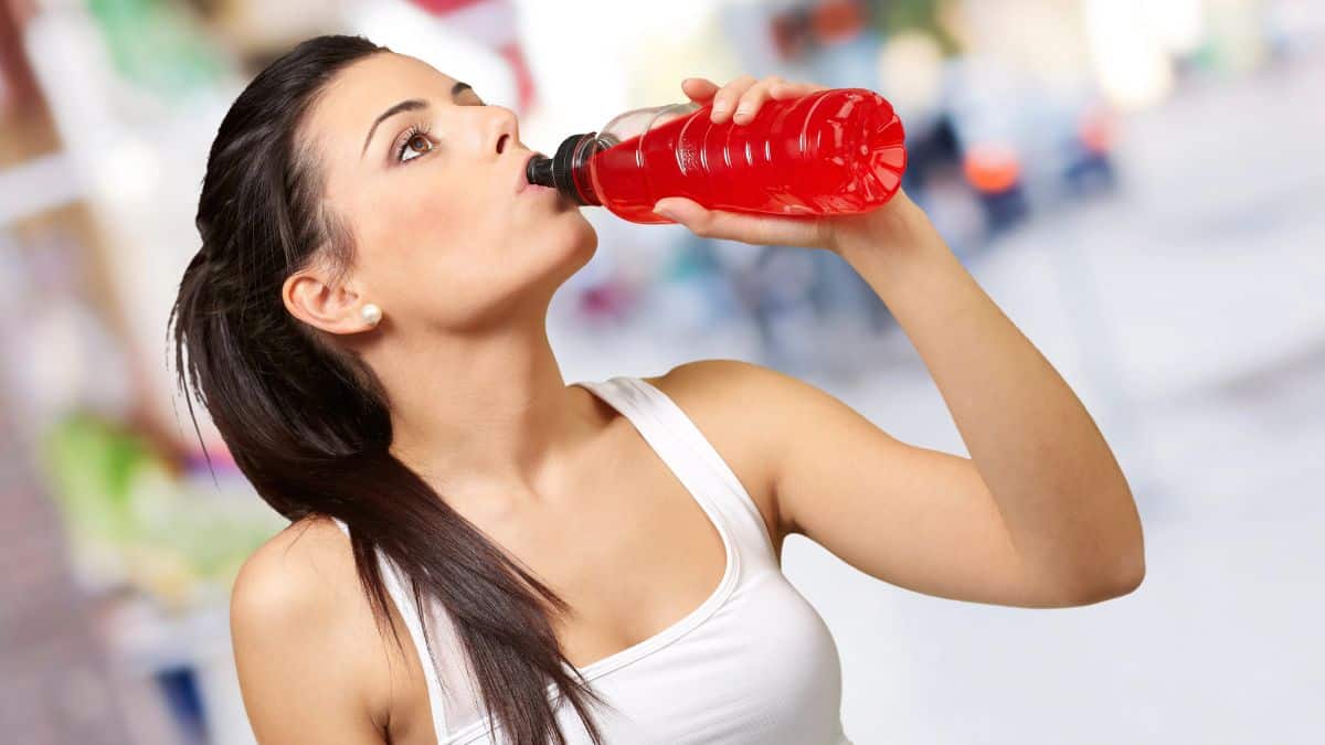 woman drinking energy drink