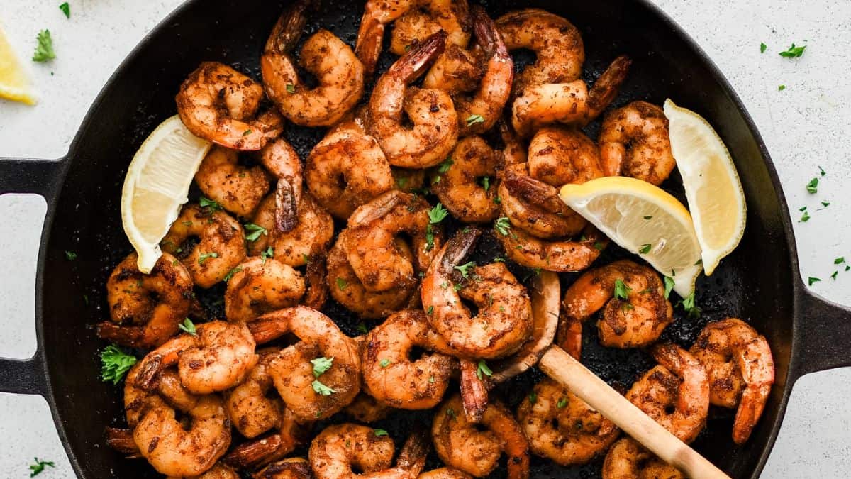Blackened Shrimp in a cast iron pan. 