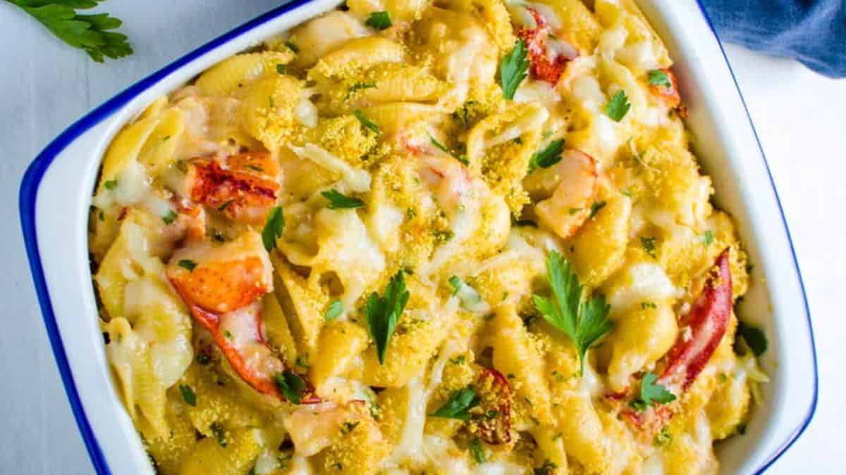 Cheesy Lobster Casserole with Shell Pasta in a baking dish.