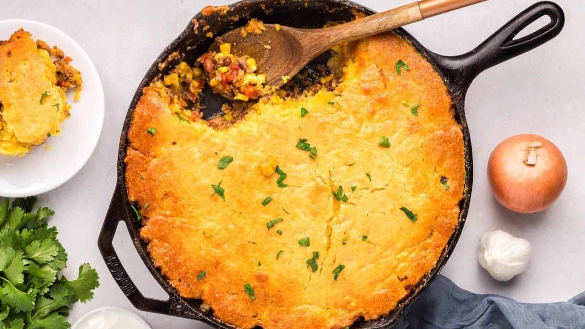 Cornbread Cowboy Casserole in a cast iron.