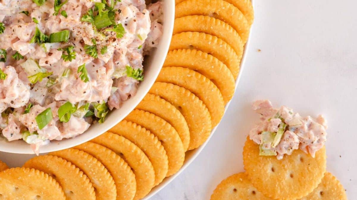 Ham Salad served in a bowl with crackers. 