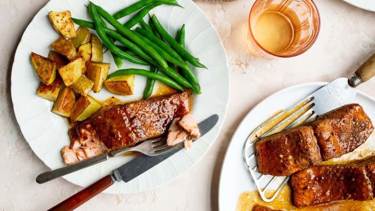 A serving of Old Bay and Honey Butter Roasted Salmon Fillets. 