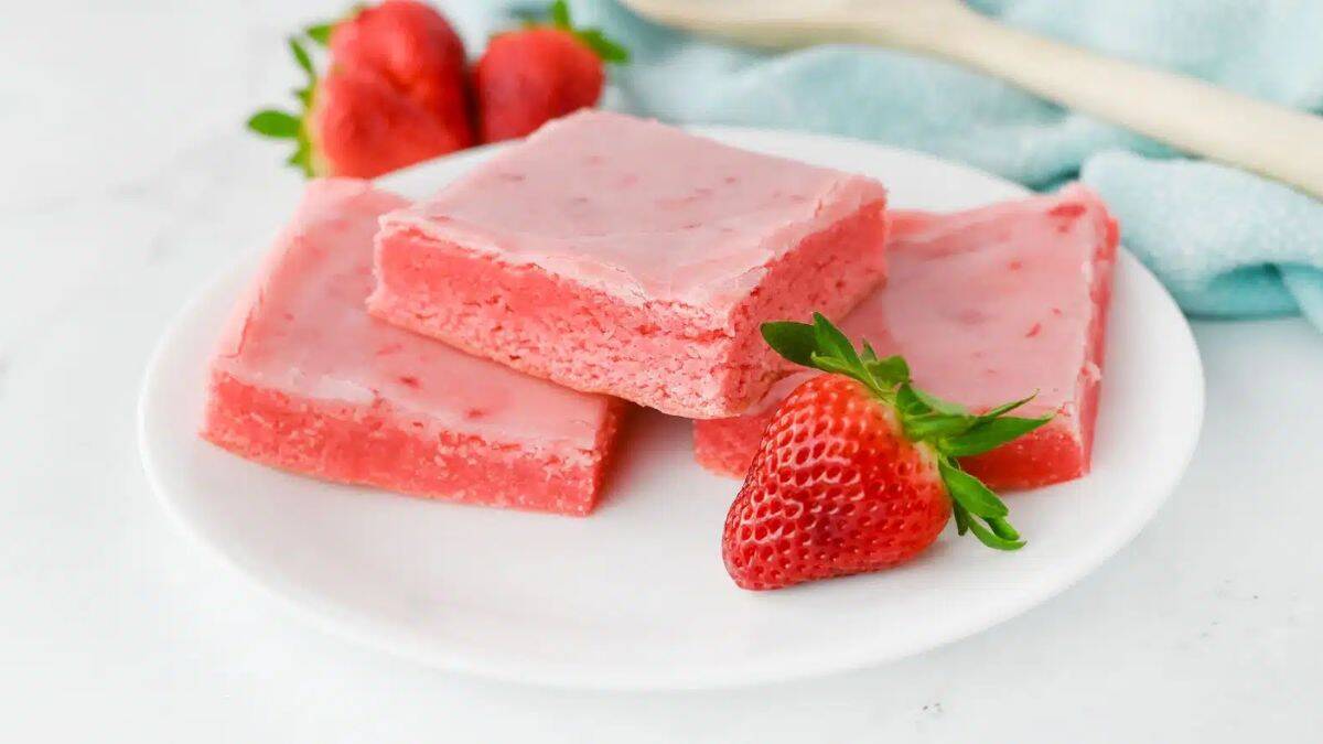 A few pieces of Strawberry Brownies served in a plate.