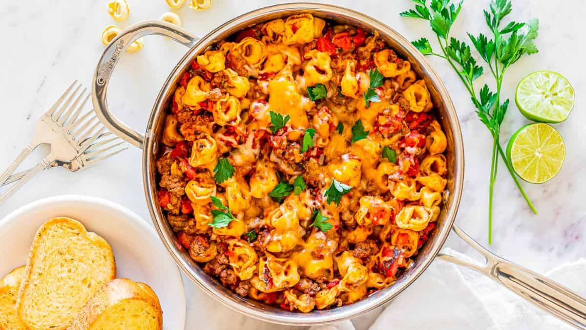 Taco Tortellini Skillet with Ground Beef in a skillet.