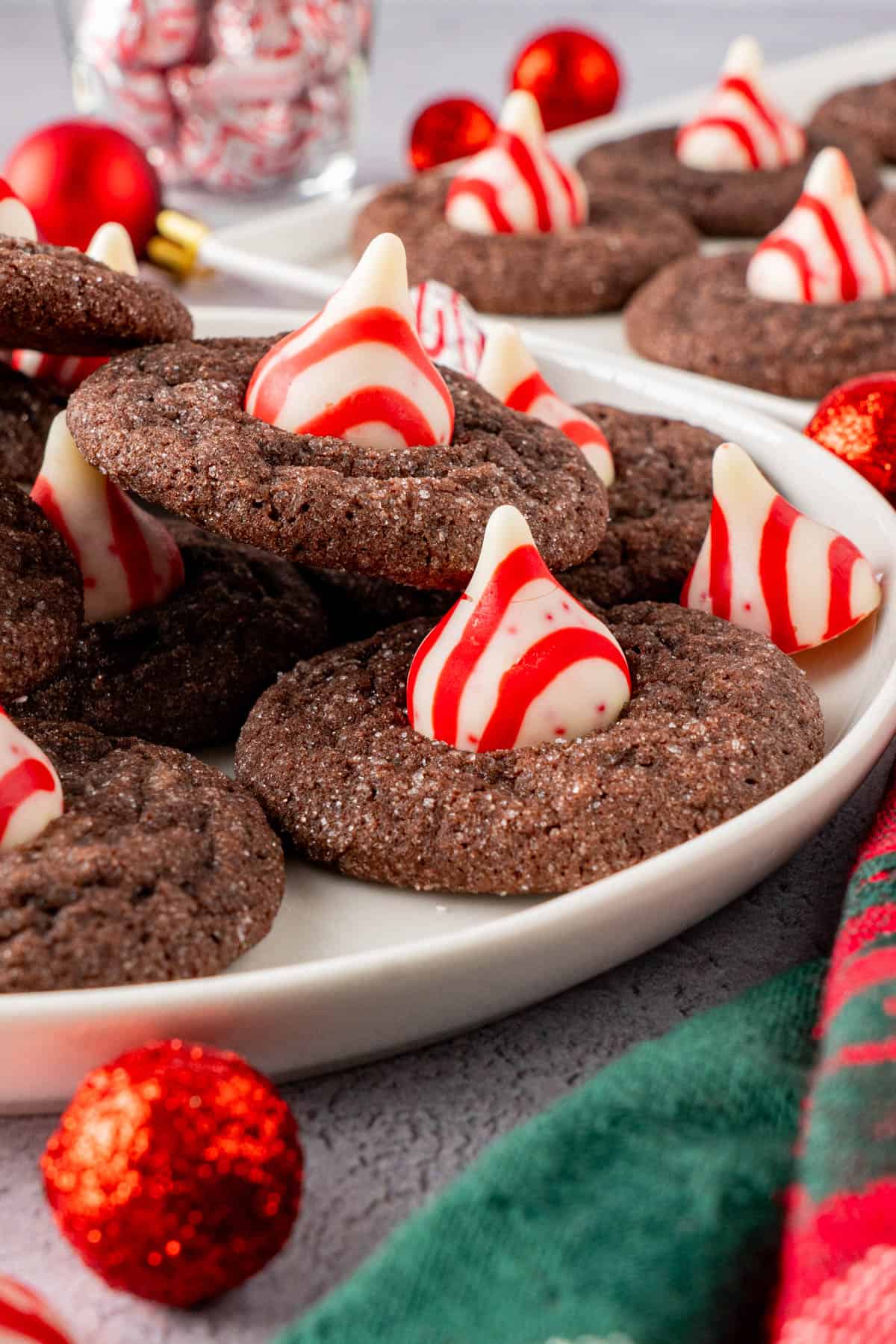 Chocolate Kiss Cookies With Hershey's Candy Cane Kisses on a plate ready to serve