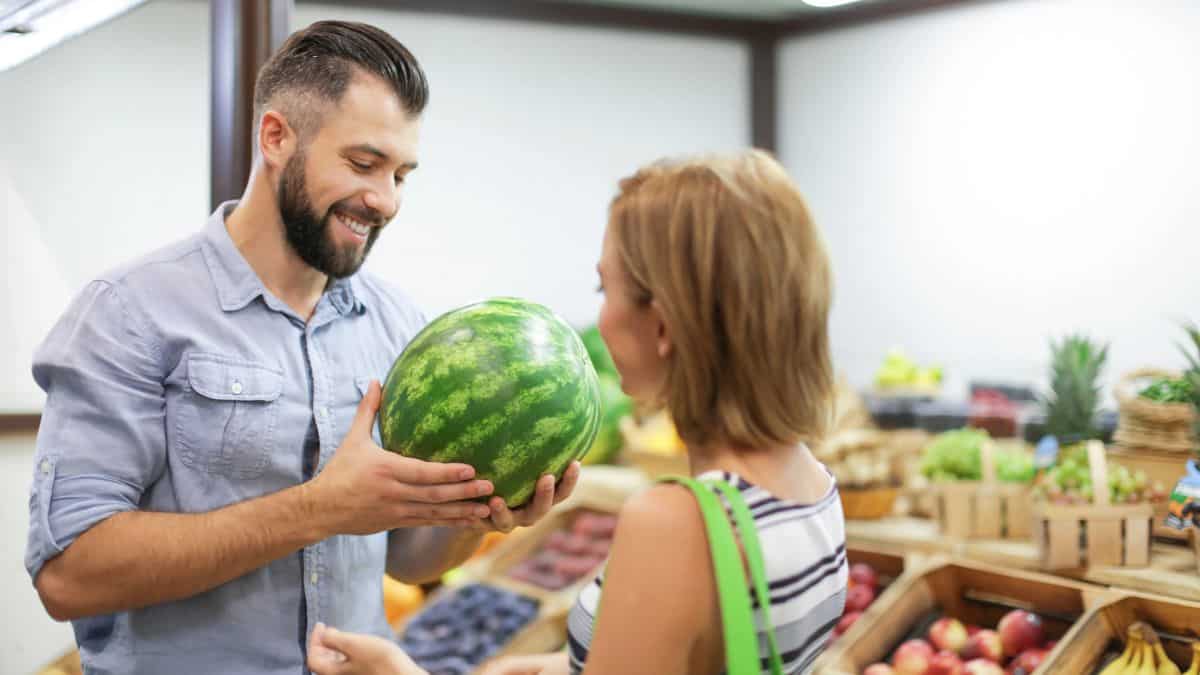 man holding watermelon