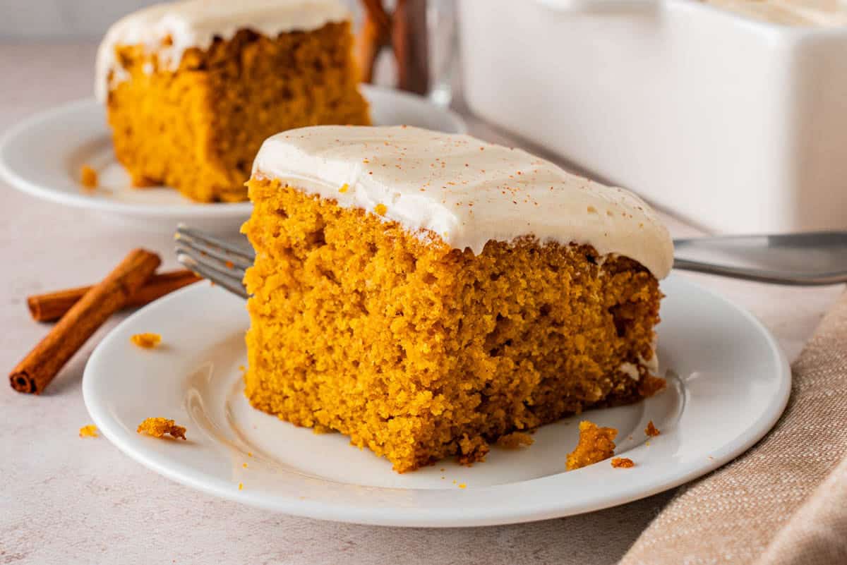 A perfect slice of Moist Pumpkin Cake with Cream Cheese Frosting