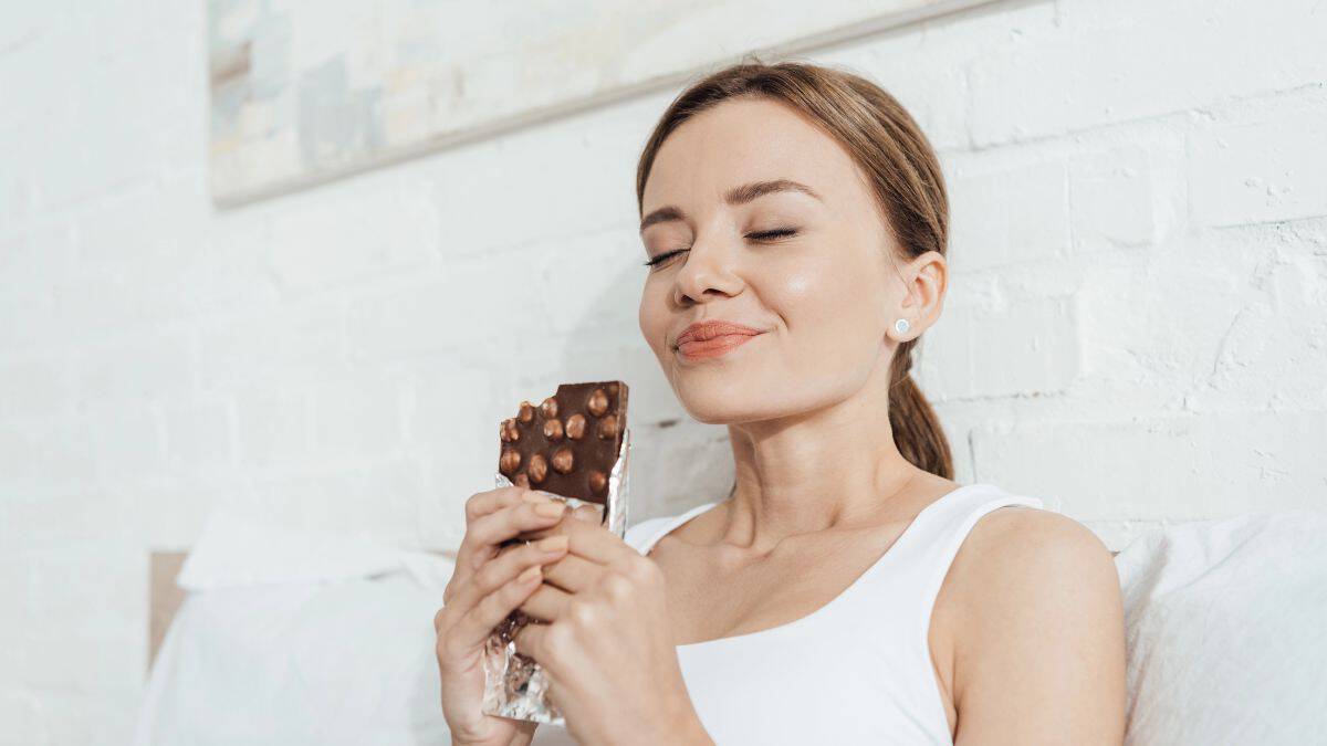 woman eating chocolate