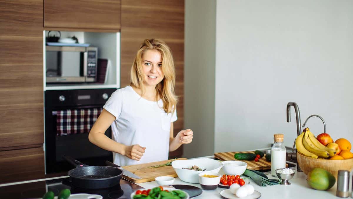 woman in kitchen cooking