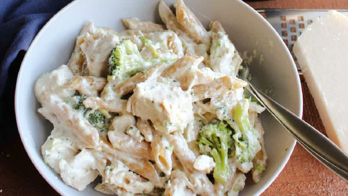 A serving of Slow Cooker Chicken Alfredo with Pasta and Broccoli.