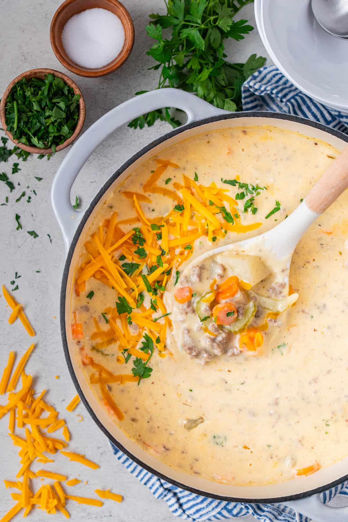 Stovetop Cheeseburger Soup with Velveeta in a pot. 