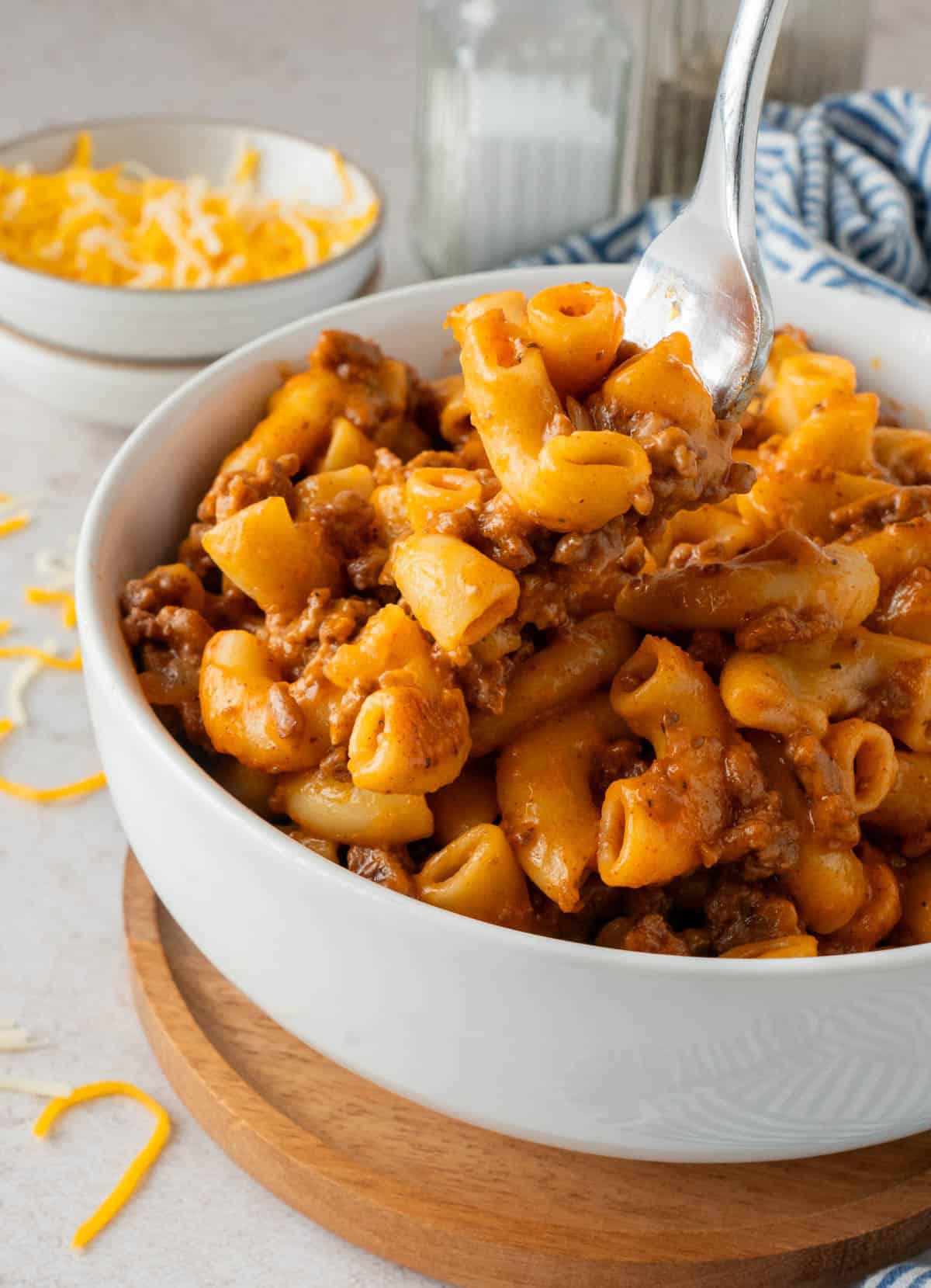 A bowl of Hamburger helper with a fork. 