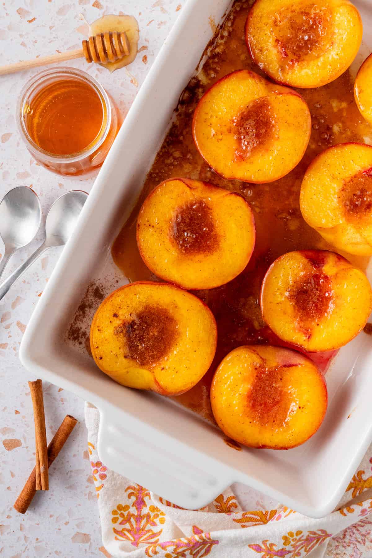 Honey Roasted Peaches (Oven Baked Peaches) in a baking dish