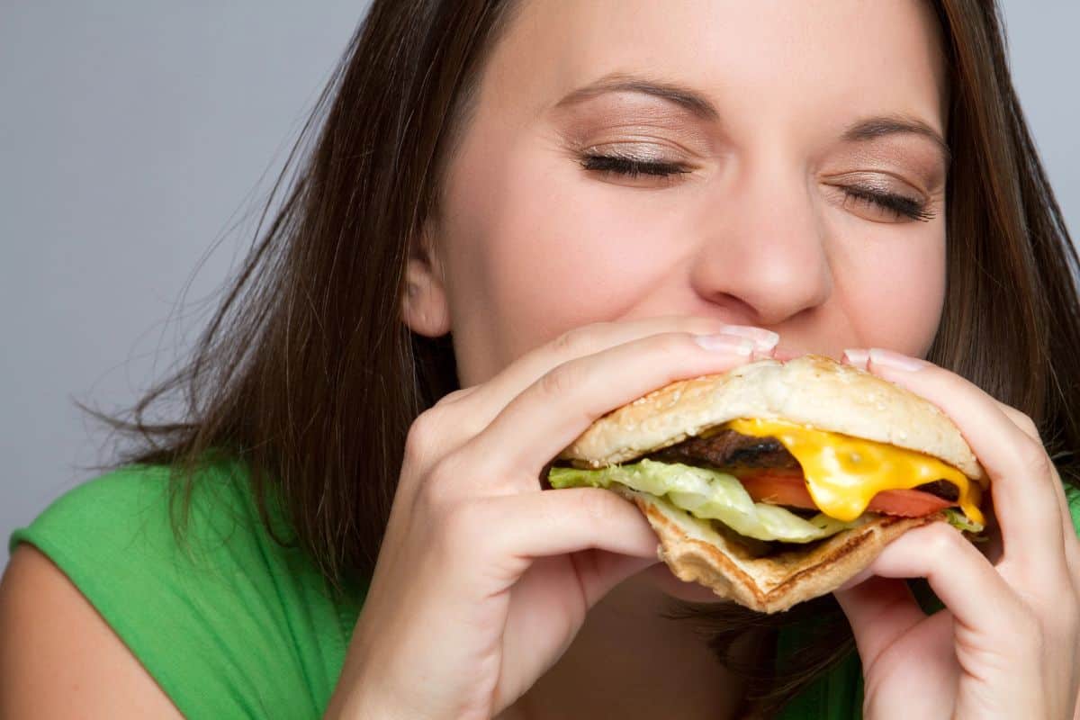 woman eating a burger