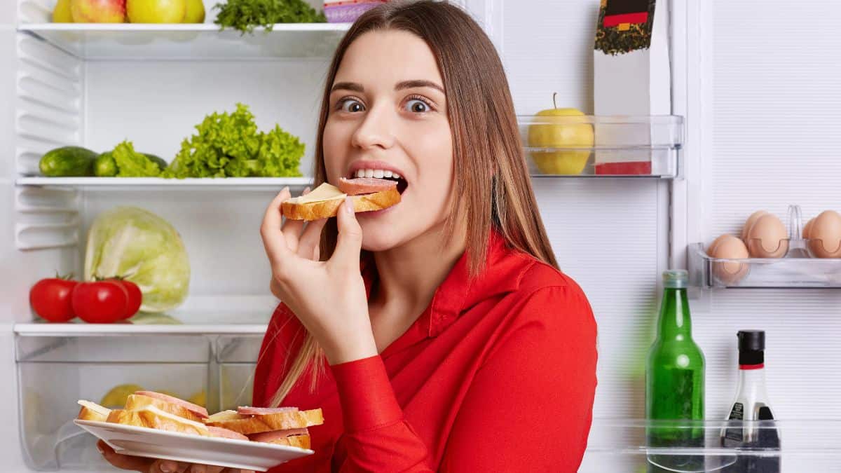 woman eating a sandwich