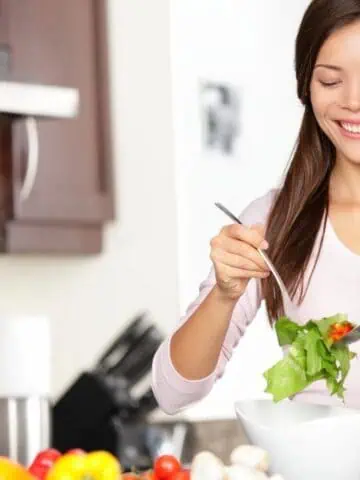 woman making salad