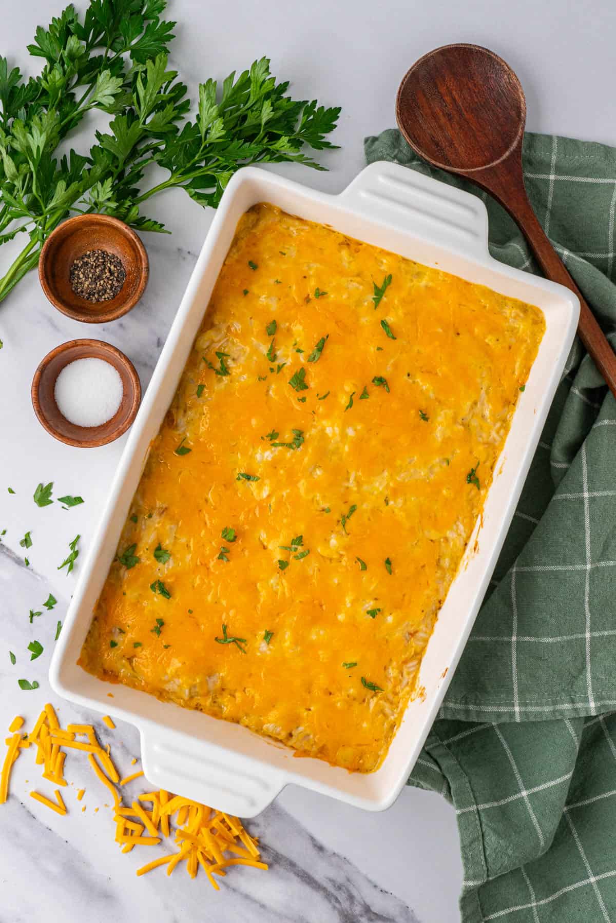 Flat lay of Cheesy Chicken and Rice Casserole in a baking dish. 