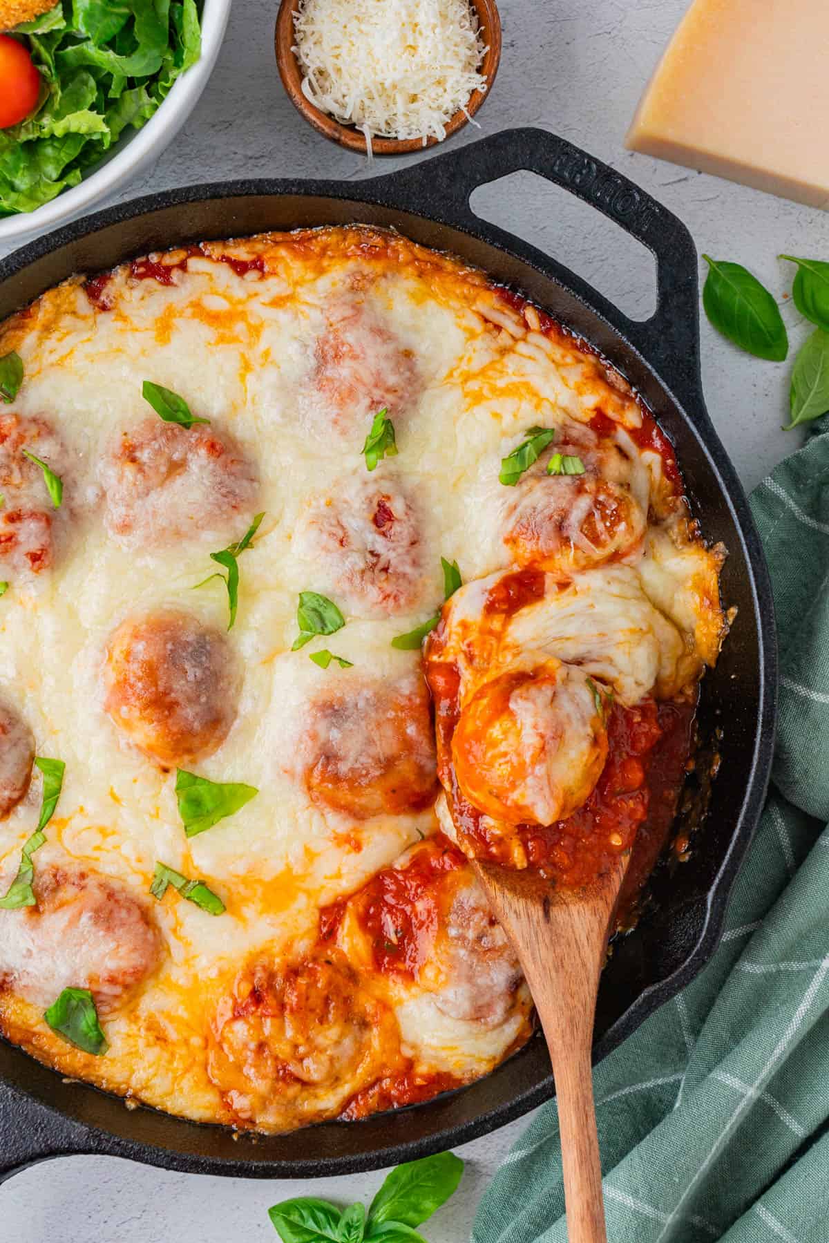 Cheesy Chicken and Rice Casserole in a cast iron skillet.