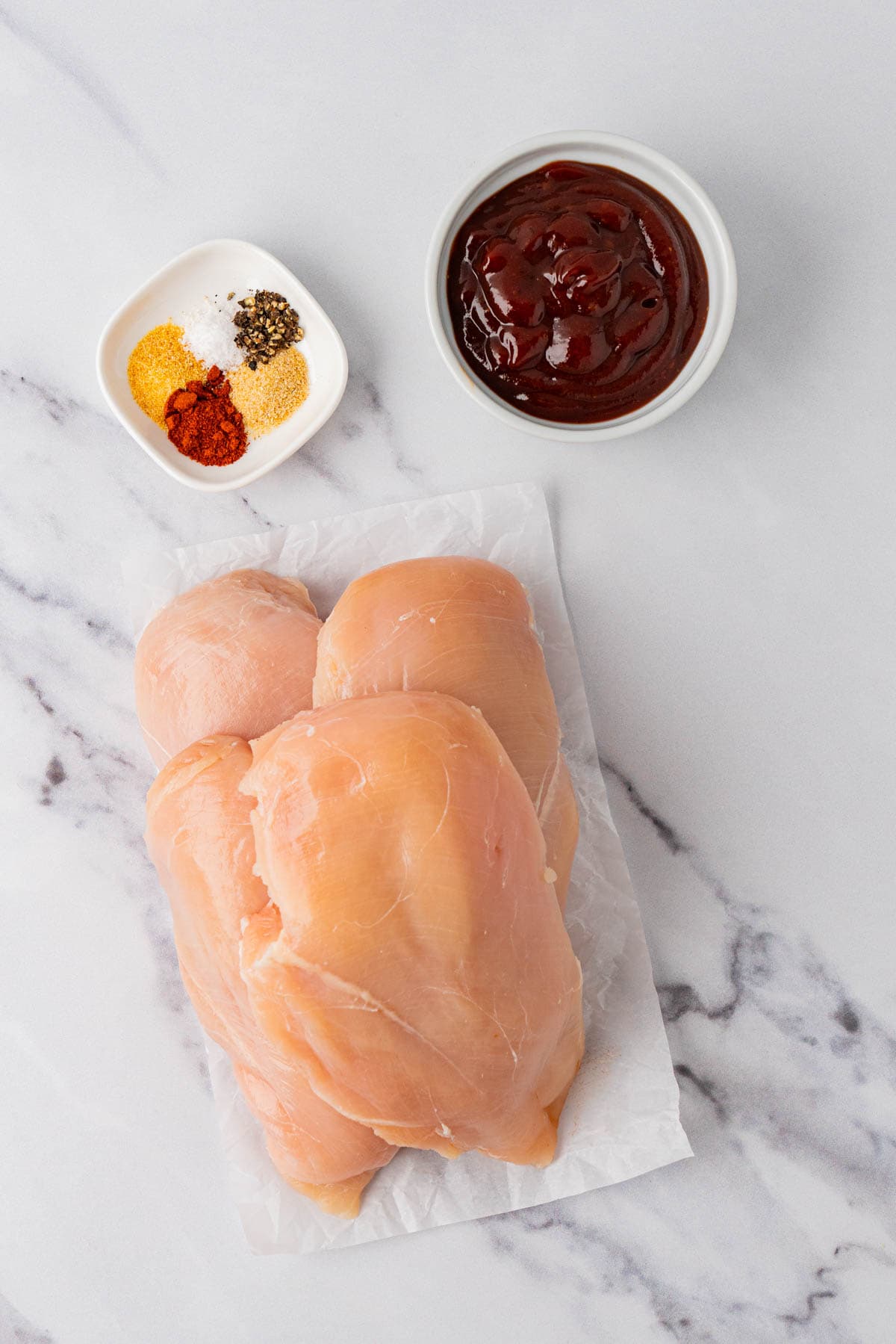 Ingredients for Crockpot BBQ Chicken spices, BBQ Sauce, Chicken Breasts