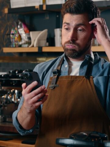 man barista looking frustrated
