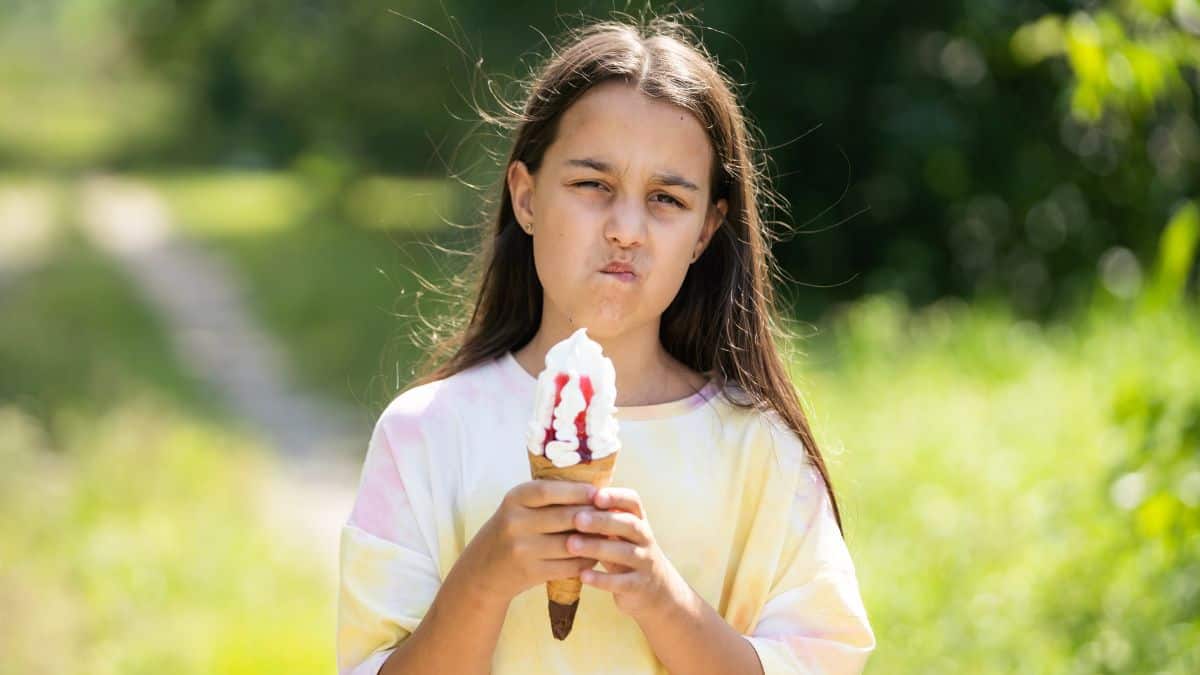 upset girl with ice cream
