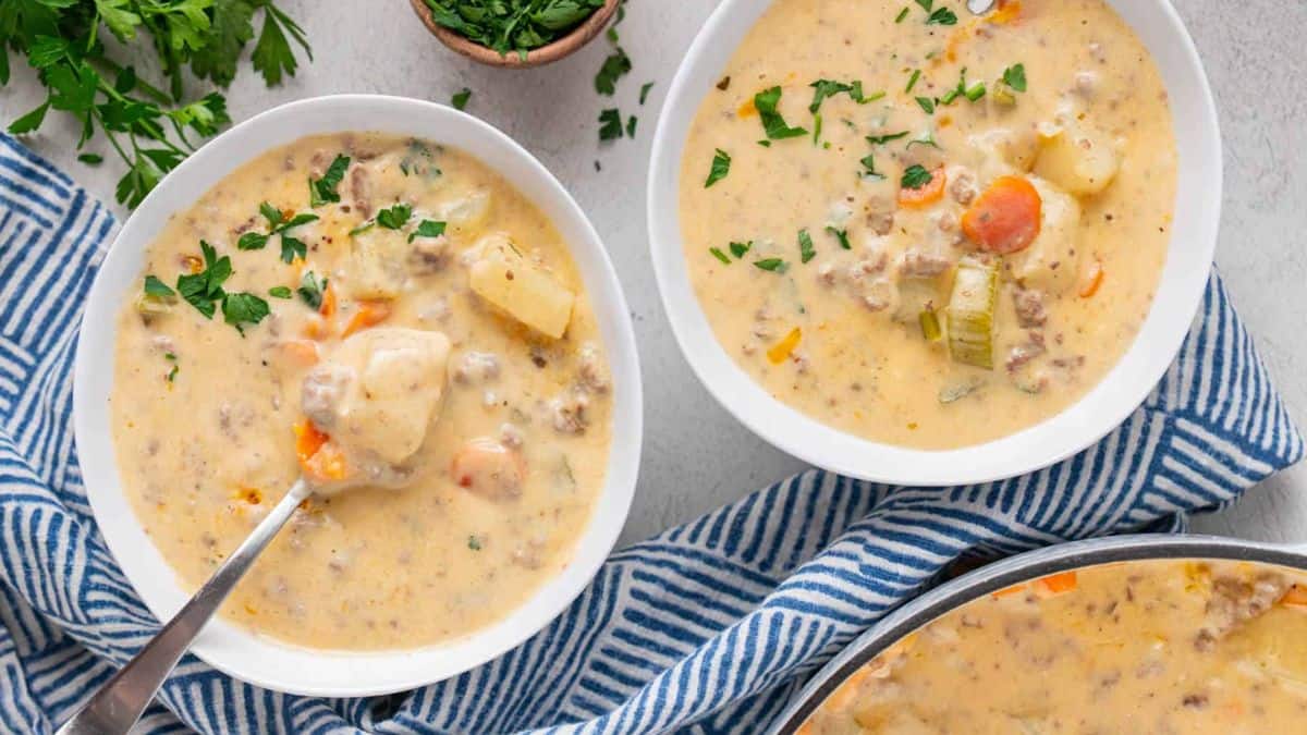 Two bowls of Stovetop Cheeseburger Soup with Velveeta.