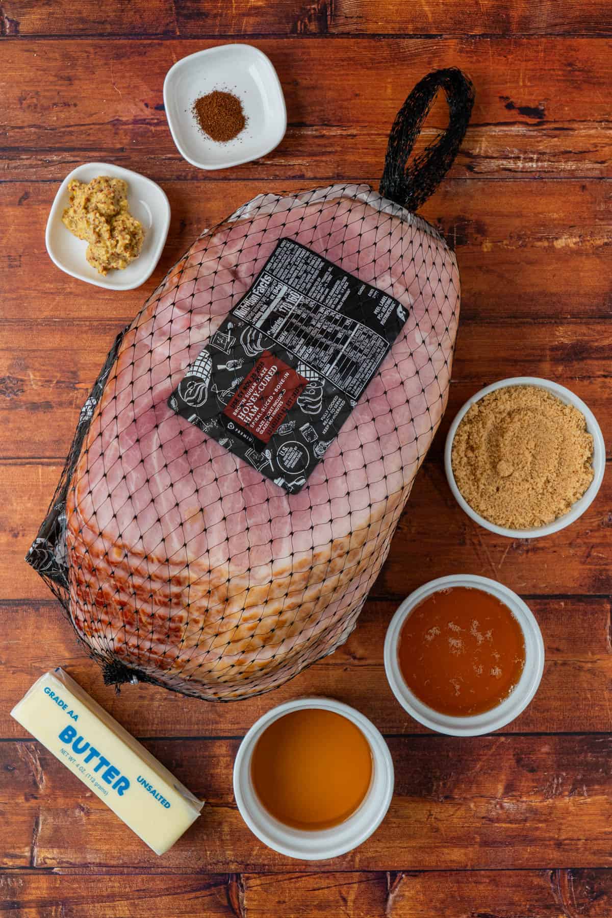 Ingredients for Honey Bourbon Glazed Ham: Dijon Mustard, Bourbon, Butter, Brown Sugar. Honey, Spiral Cut Ham.