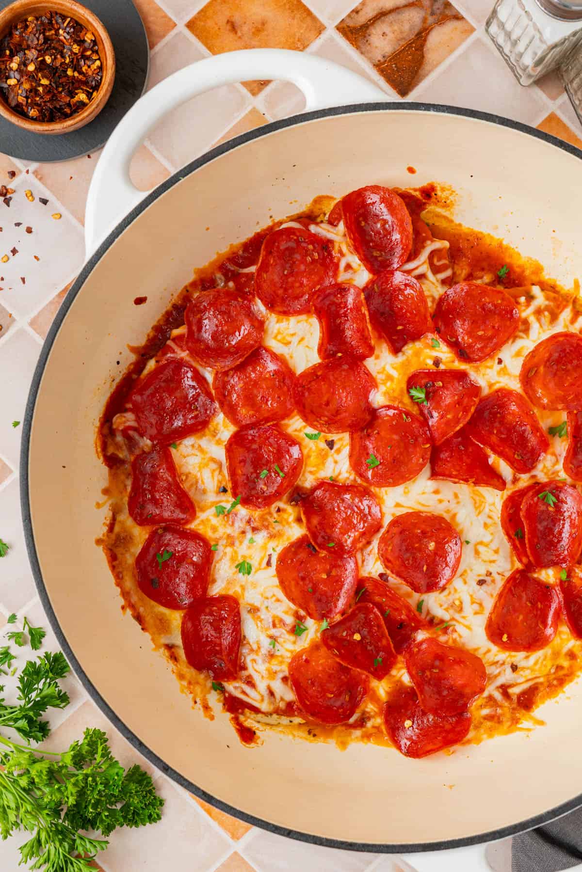 A top shot of Low Carb Pizza Chicken in a skillet. 