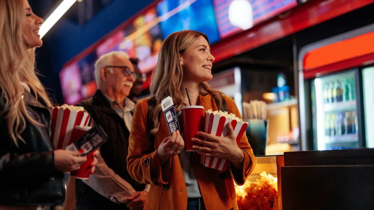 woman with snacks at the movies