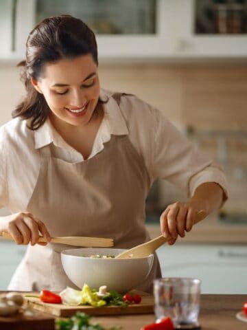 happy woman cooking