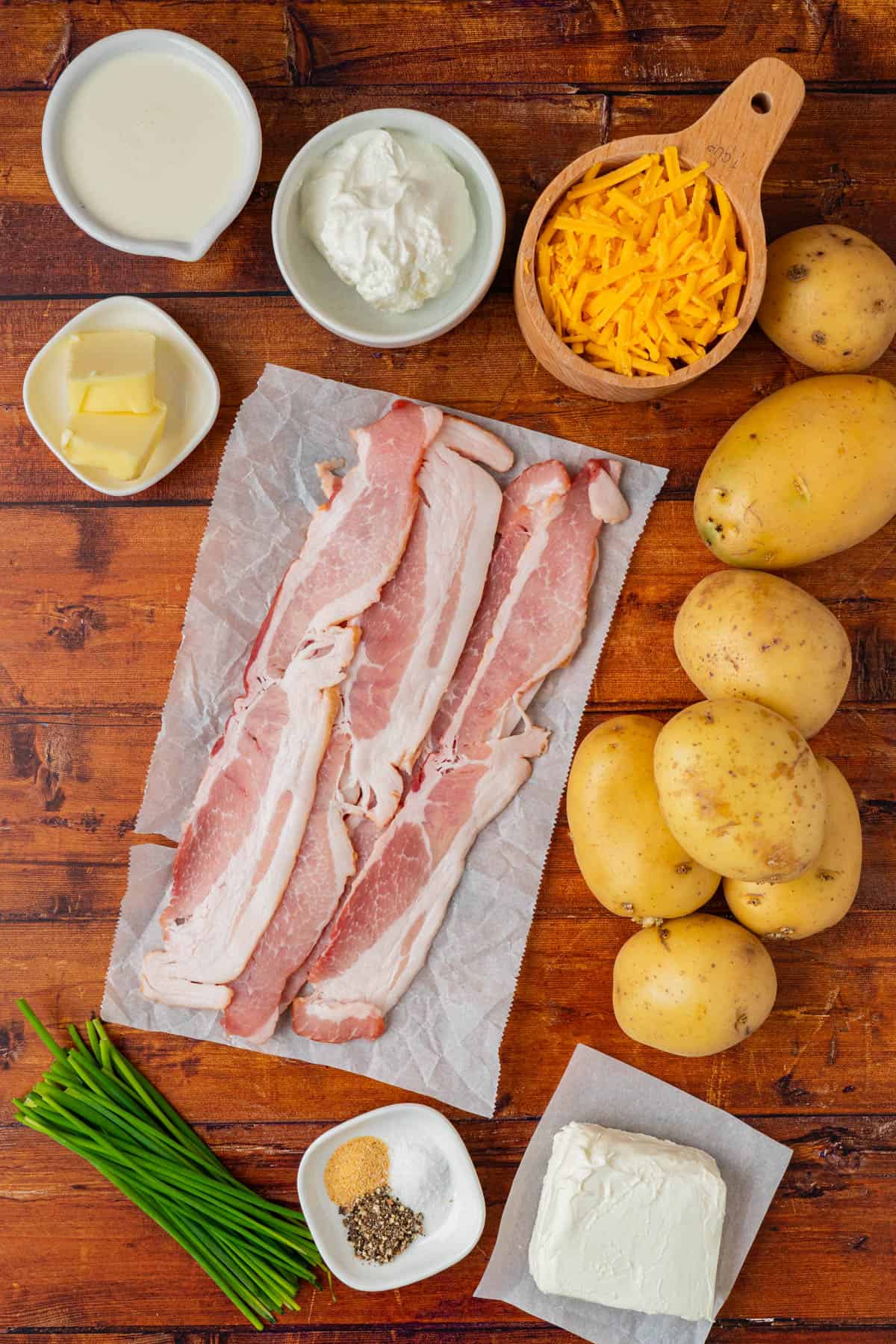 Ingredients needed to make loaded mashed potato casserole.